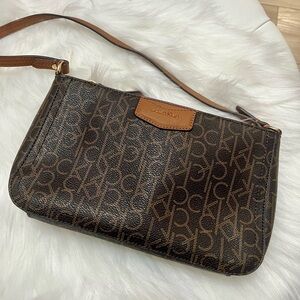 NWOT Calvin Klein Black and Brown Monogram Clutch